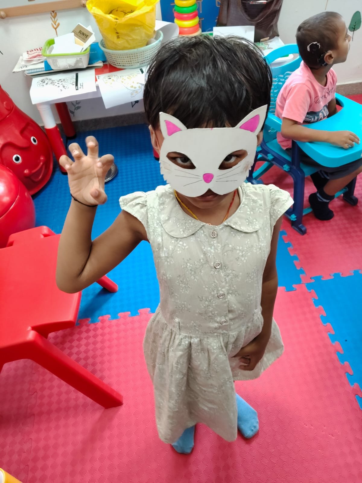 child meowing
